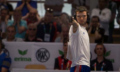 MUNICH - JUNE 10: 5th placed Clement BESSAGUET of France competes in the 25m Rapid Fire Pistol Men Finals at the Olympic Shooting Range Munich/Hochbrueck during Day 5 of the ISSF World Cup Rifle/Pistol/Shotgun on June 10, 2014 in Munich, Germany. (Photo by Wolfgang Schreiber)